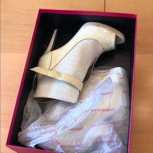 Cream and crocodile skin heels